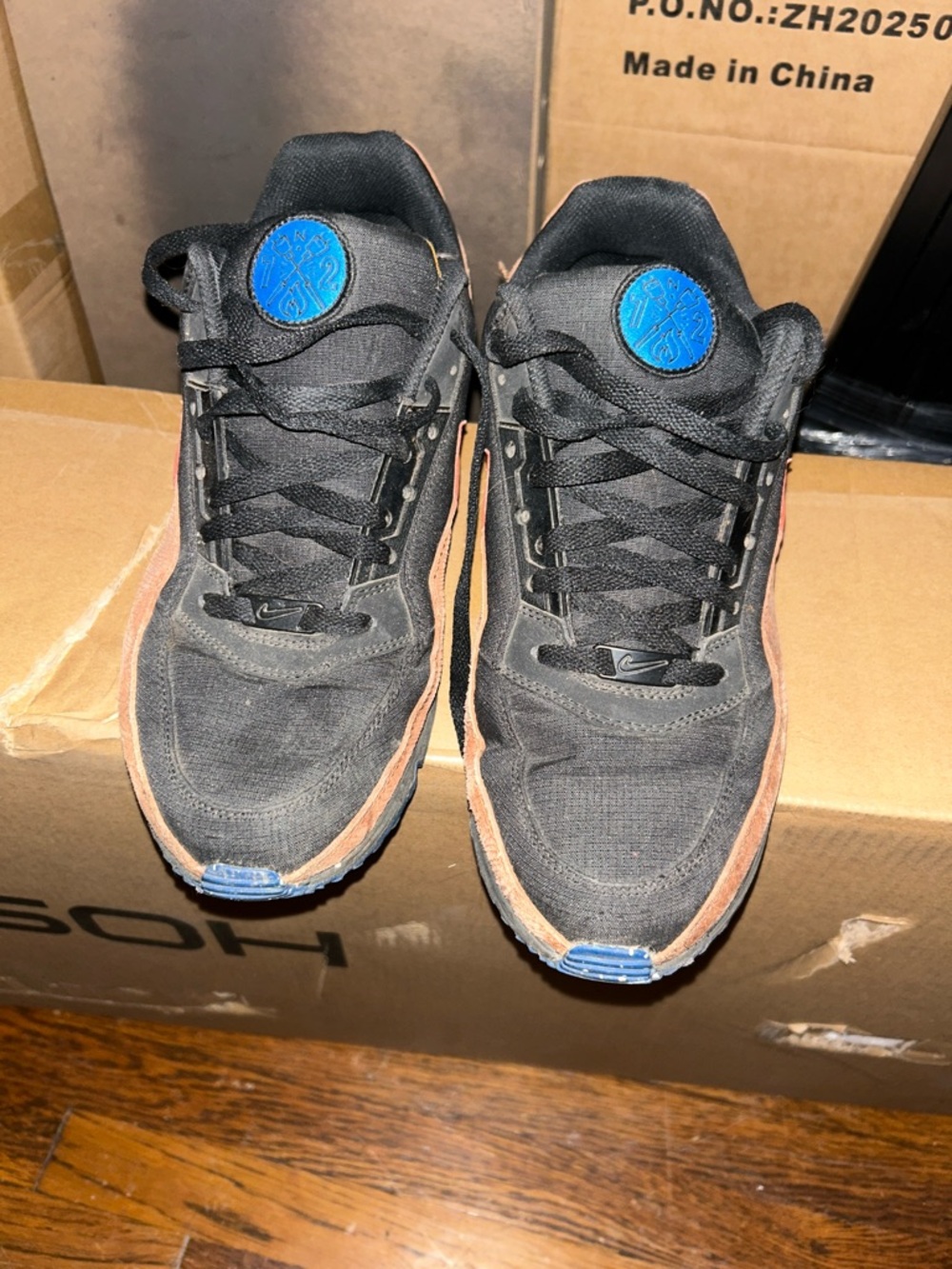 Nike Men's Black Sneakers with OrangeTrim and Blue Logos